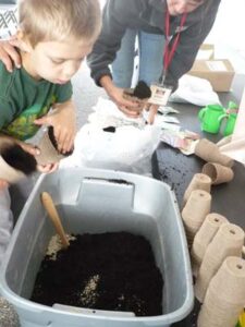 Kids Have Fun Starting Seeds at the FAIR Image